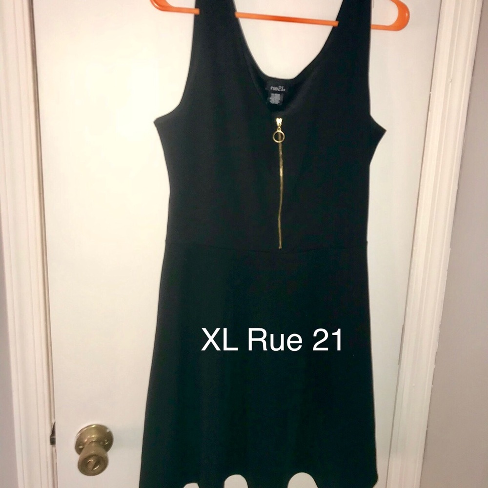 Black dress with gold zipper in front